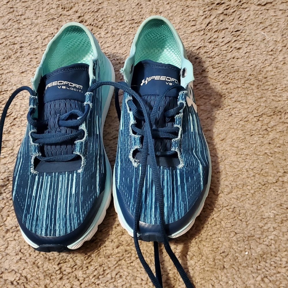 Woman Under Armour  sneakers size 7.